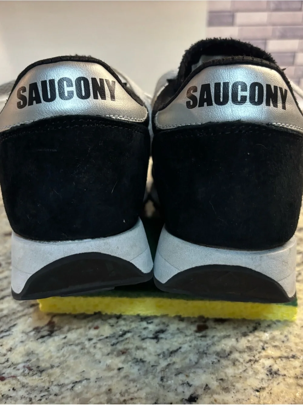 Saucony Black and Silver Retro Runner Sneakers